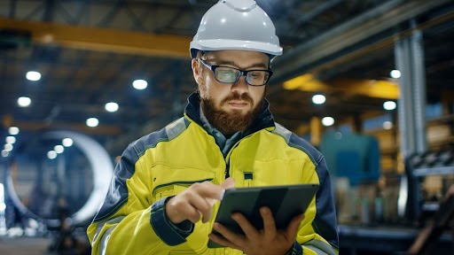 How to Complete a Consumer Confidence Report (CCR) with a man in hardhat touching a touchpad. Also has play button to watch/listen to a video. 
